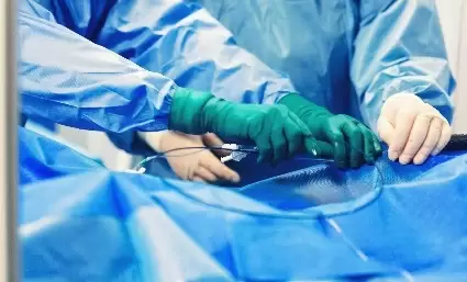 Two doctors performing ​Neurovascular stent surgery.