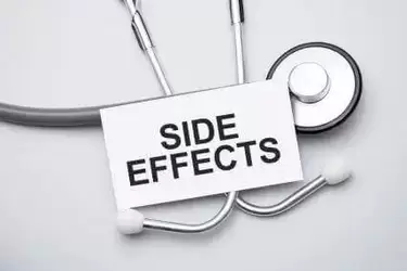 side that says side effects surrounded by medical equipment.