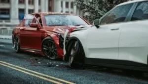 A Nashville car accident involving red and white car in a head on collision