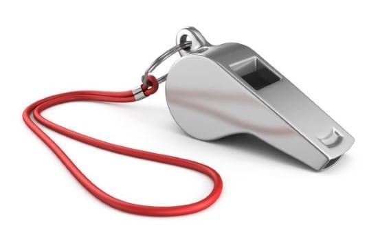 silver whistle with a red next rope