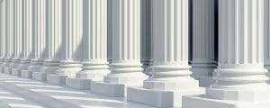 Two rows of very white clean marble pillars