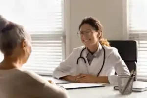 women involved in a Nashville automobile accident meets with her doctor and discusses need to get a Nashville automobile accident lawyer