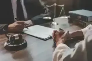 Nashville distracted driver accident lawyer meets with client who was in a car wreck caused by a distracted driver