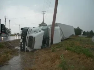Truck accident in Nashville where truck rolled over and hit telephone pole