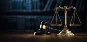 hammer and scales of justice to illustrate a Nashville wrongful death attorney evens the playing filed with a corporation in a Nashville wrongful death