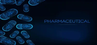 blue pills on blue background with pharmacy written beside