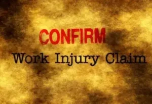 Work injury claim gold and black with red writting