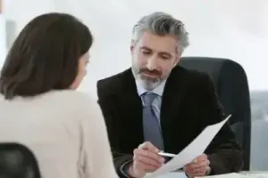 Personal injury attorney in White House in a meeting with client