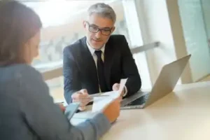 Car accident lawyer in Brentwood meets with client do discuss a Brentwood car accident lawsuit