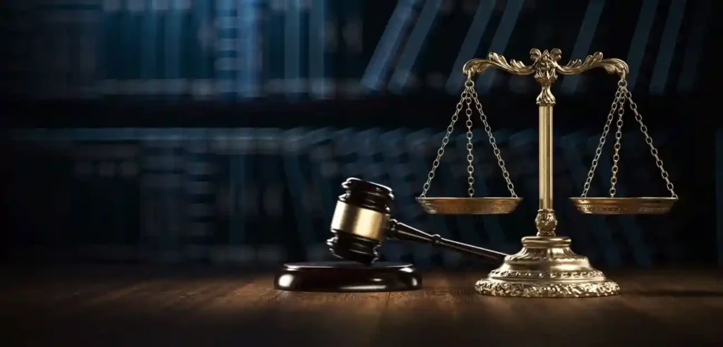 scales of justice next to hammer and gavel illustractive of how to file a class action lawsuit by meeting the requirements for a Neogen Class Action Lawsuit.