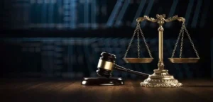 scales of justice next to hammer and gavel