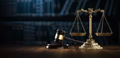 scales of justice next to hammer and gavel
