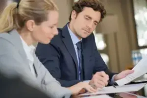 Female Columbia Social Security Disability Lawyer meets with her client prior to hearing on social security disability benefits