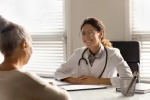 Women meets with her doctor prior to meeting with her Nolensville Social Security Disability Lawyer