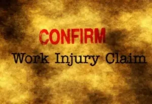 Work injury claim gold and black with red writting