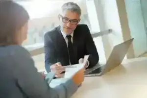 Nolensville Social Security Disability Lawyer meets with his female client about social security benefits