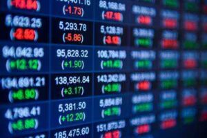 blue stock ticker white and green foreground 3d, used for loss causation in UroGen Lawsuit