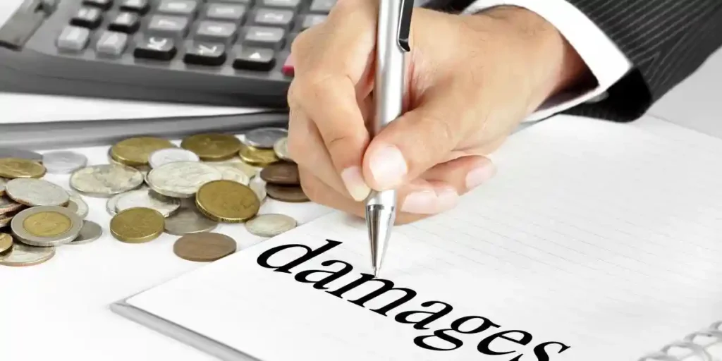 man writting on white sheet of paper that says damages used in Fortinet class action lawsuit