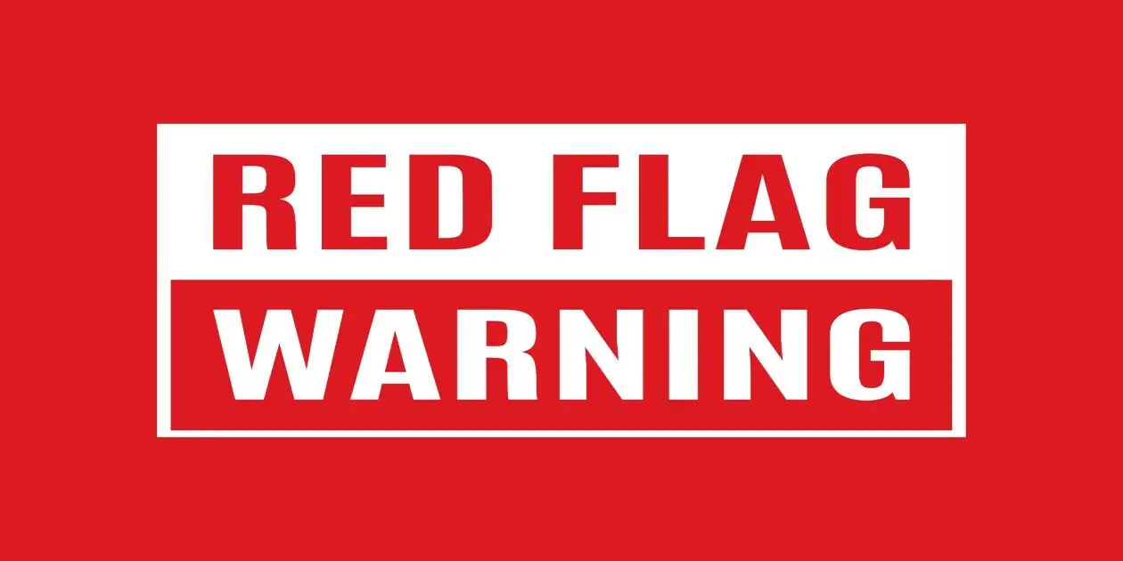 red and white warning sign used in Detecting Revenue Recognition Fraud
