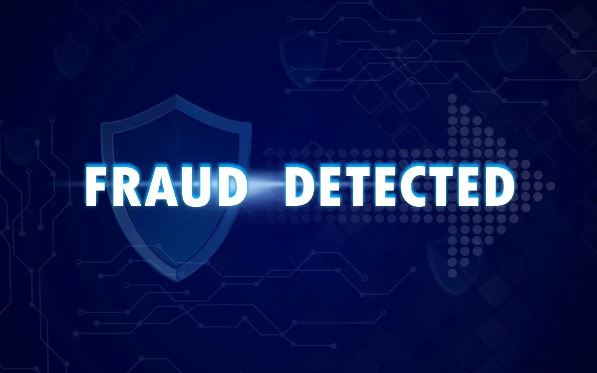 fraud detected in whilte on dark blue background used in Financial Statement Fraud Red Flags