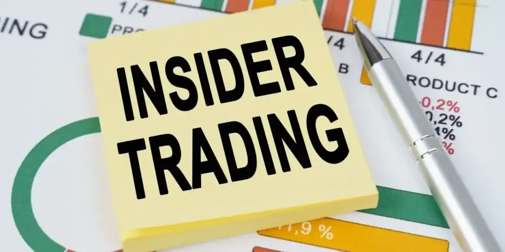 Insider Trading in Black on yellow notepad on top of stock chart, used in Gemini Space Class Action Lawsuit