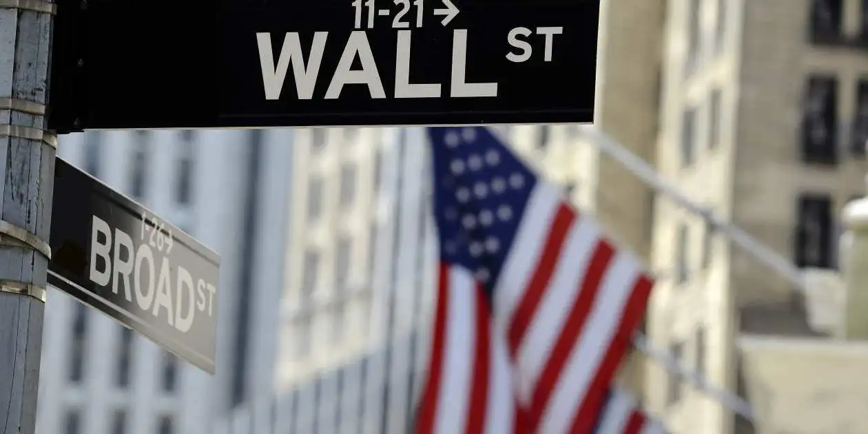 Wall street sign with American flag waving in background in securities litigation
