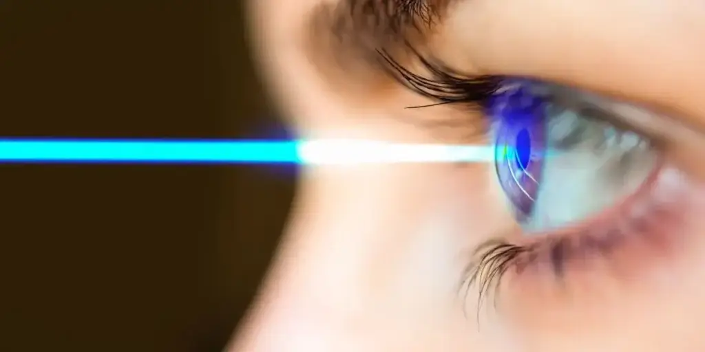 lazer coming out of a young girl's beautful blue eye used in Zepbound Eye Pressure