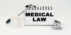 Medicine and health concept. On a white table lies a stethoscope, pills and a notebook with the inscription - MEDICAL LAW (92 matches) used as feature image in Criteria for a Dupixent Cancer Lawsuit, diagnosed with cancer, Dupixent and Cancer, Dupixent and Cancer Side Effects, what are the Dupixent and cancer risks, Dupixent Cancer Lawsuit, Dupixent cancer claims, Dupixent cancer Lawyer, Dupixent and Cancer Risks, eligible for a Dupixent Cancer Lawsuit, Dupixent Lawsuit, qualify for a Dupixent Cancer Lawsuit, Failure to Warn, Compensation in a Dupixent Cancer Lawsuit, Dupixent class action lawsuit, Is there a Link Between Dupixent and Cancer,