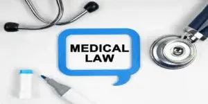 Medicine concept. On the table is a stethoscope, a marker and a sign with the inscription - MEDICAL LAW used as feature image in Zepbound and eye floaters