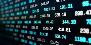 Digital screen of Stock Market with updating stats, number of sales, percentage, growth, decline. Abstract financial background, economic report, forecast. Investments, banking, commerce.