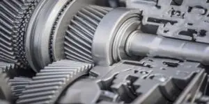 brand new sliver transmission sitting on wooder table used in Defective GM Transmission Problems