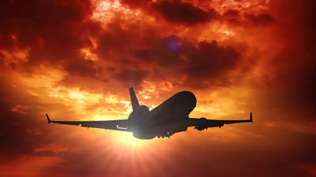 passenger plane flying with a beautiful sunset in background used in Toxic Fume Events