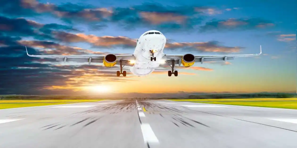 Airplane taking off clound and sunset in background used in Exposed to Toxic Airplane Fumes