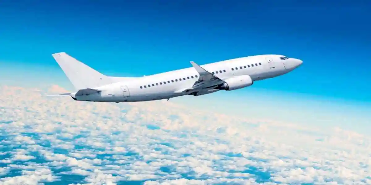 white and blue passenger jet takes of on a sunny morning used in Aerotoxic Syndrome 