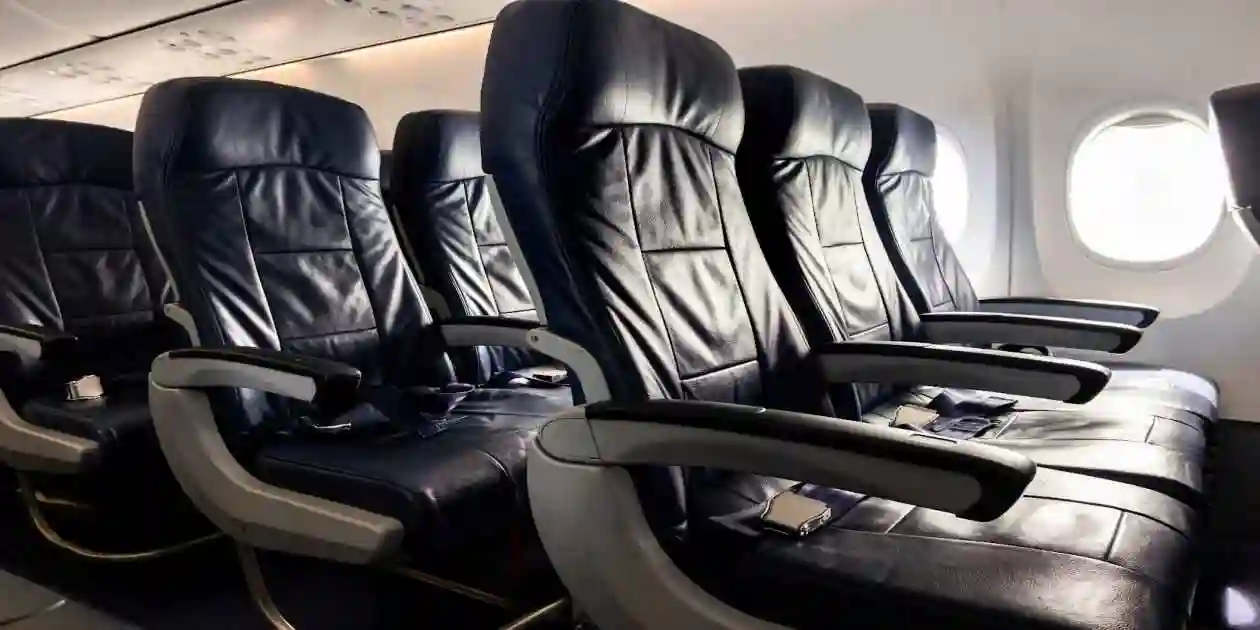 empty airplane cabin with leather black seats used in Toxic Fume Exposure