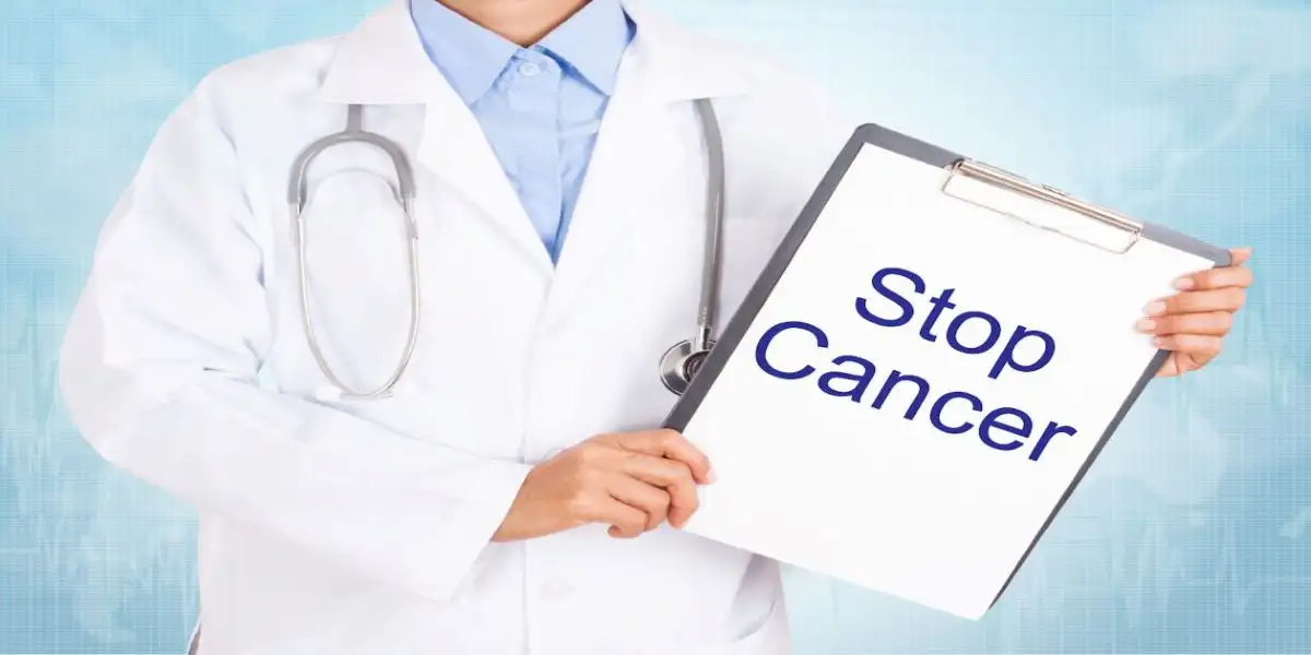 doctor holding sign that says stop cancer used in Dupixent and Cancer Risks