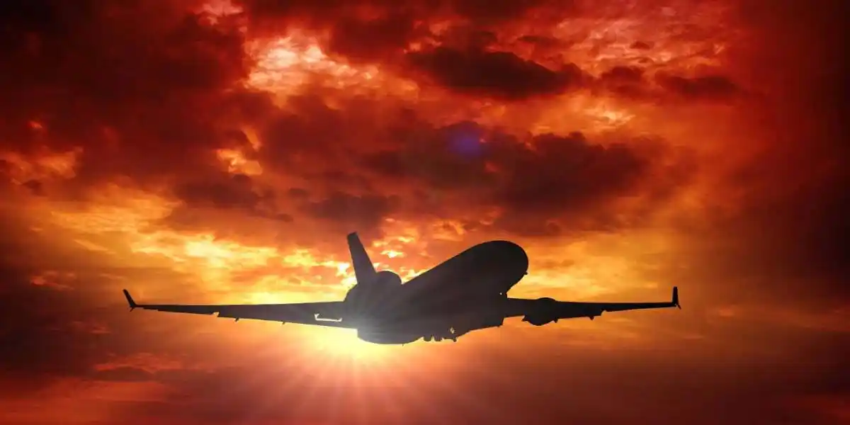 passenger jet landing at sunset used in Exposure to Toxic Airplane Fumes 