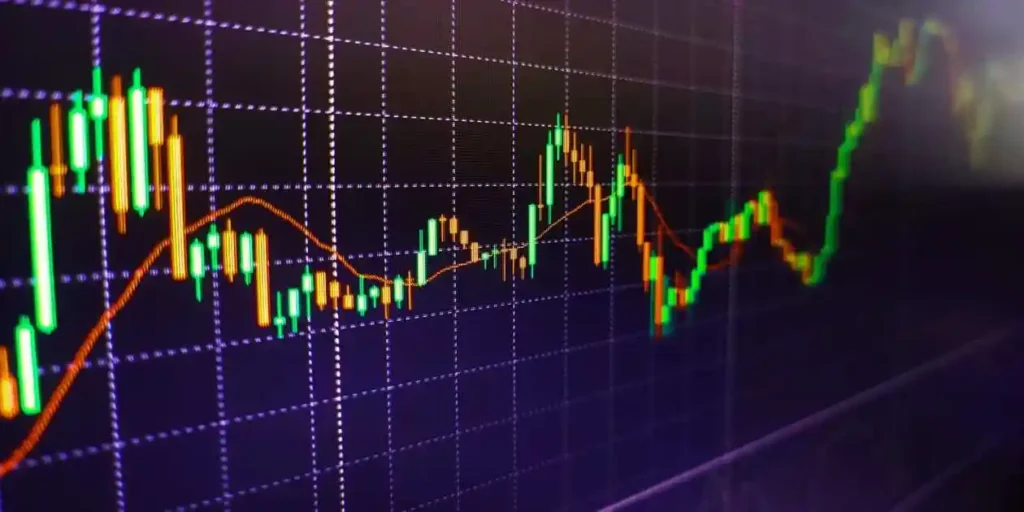 Stock market data information. Pads with color diagrams and color shining on background. Tablet computer with business chart. Stock market graphs and charts analysis used in Phreesia Class Action Lawsuit