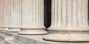Pillars and stairs white marble. Classical columns in a row. Athens Greece Academy neoclassical building entrance colonnade. used in Zepbound Vision Loss Lawsuit