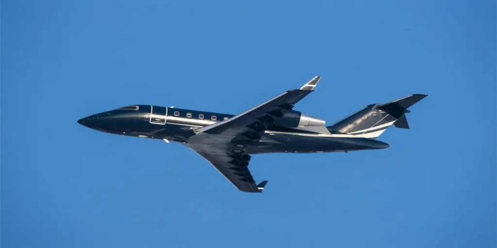 black jet fying on a pefect sunny day used in Toxic Cabin Fumes