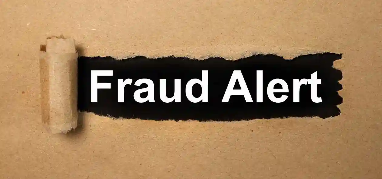 Fraud alert, text on white paper on torn paper backgroundused in Aldeyra Therapeutics Class Action Lawsuit