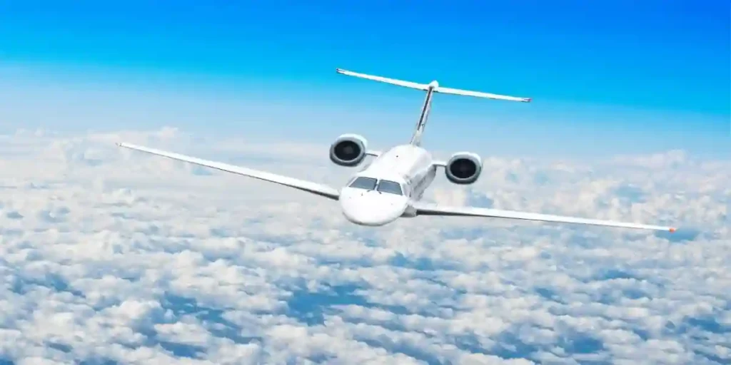white plaine flying in clounds on nice day used in Aerotoxic Syndrome Lawyer