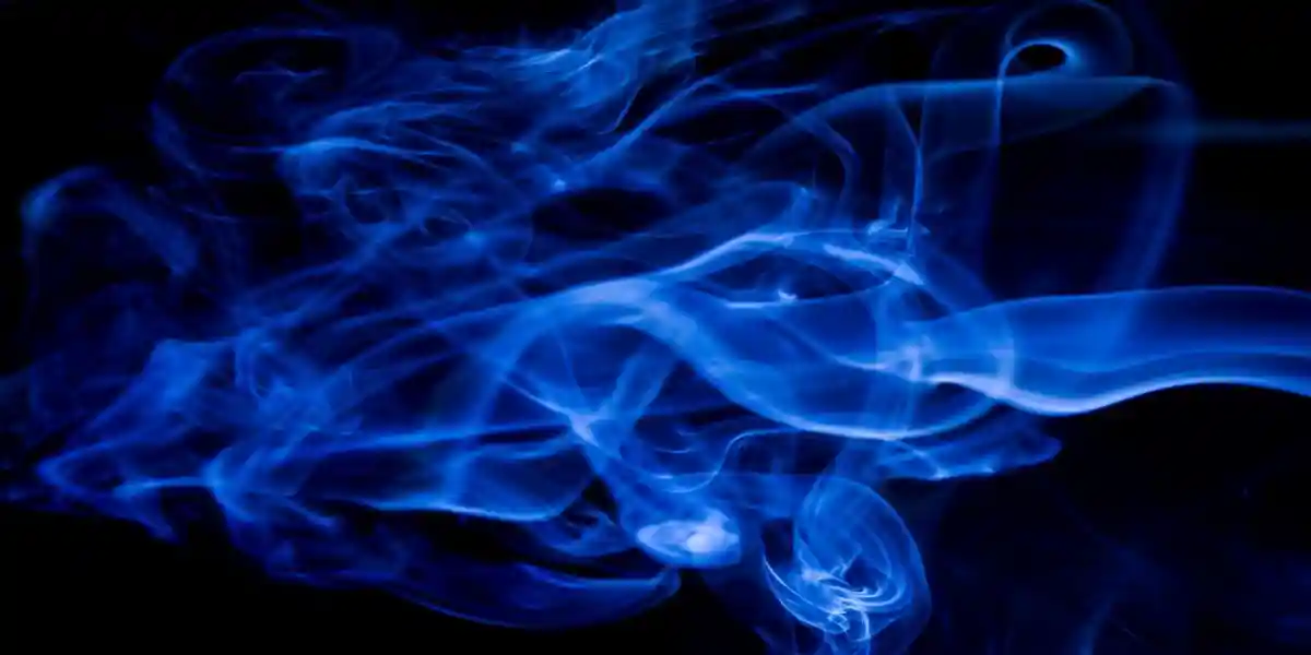 blue toxic fumes on black  background used in Memory Loss After Fume Event