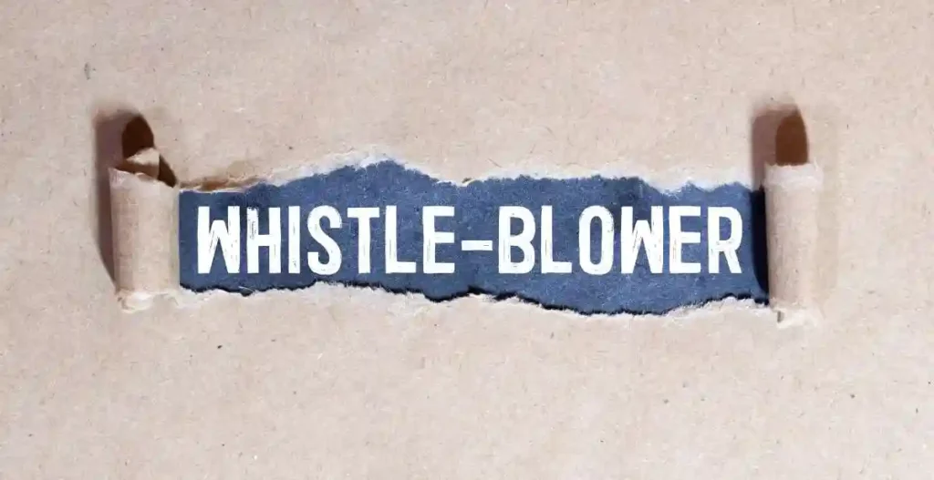 Whistleblower on white torn paper. Whistleblower on white torn paper. used in Whistleblower Lawsuits in Nashville