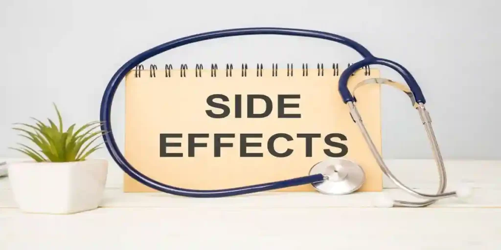 Side Effect word with stethoscope on wooden background as medical concept used in Compensation for a Pharmacy Medication Error