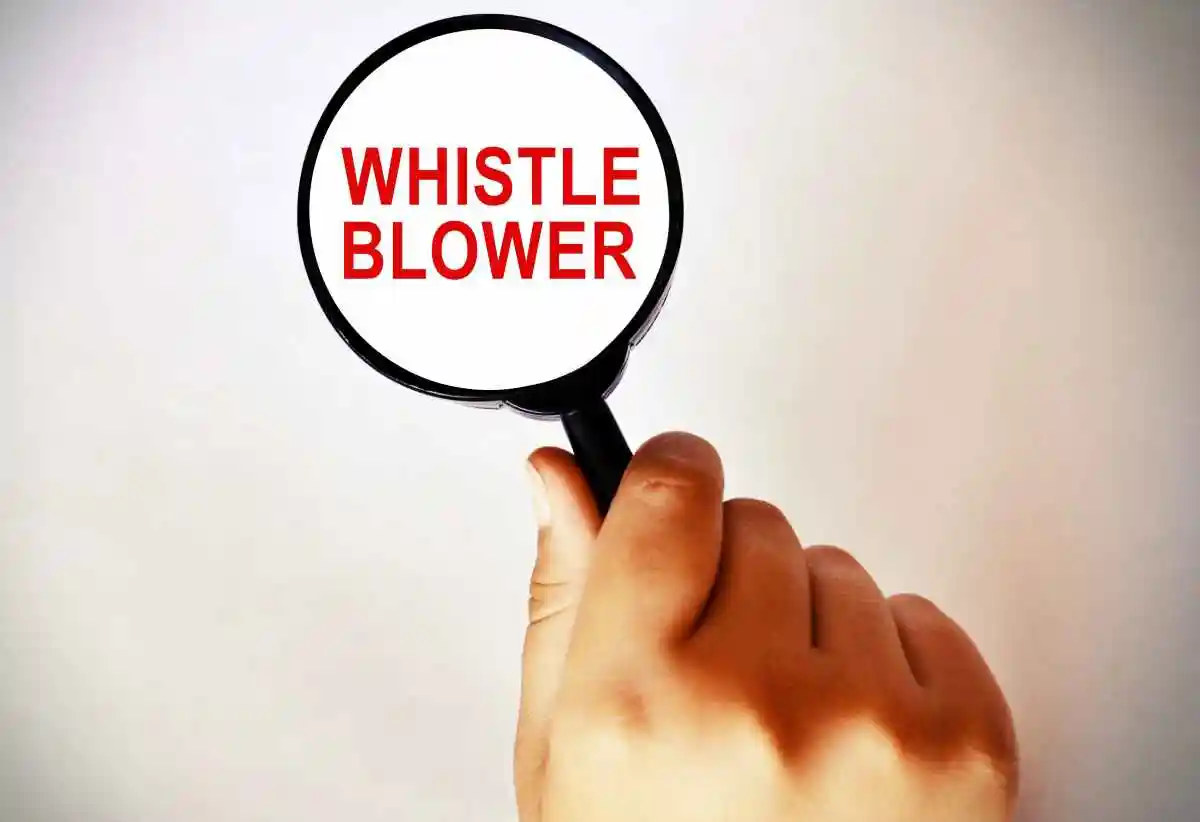 Whistle Blower text, Report Crime Violation Breaking Laws Magnifying Glass 3d Illustration used in Nashville whistleblower lawsuit