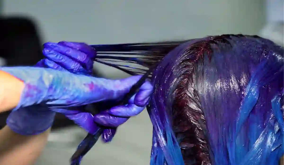 girl getting hair dyed blue used in Nashville Hair Dye Lawsuit Update
