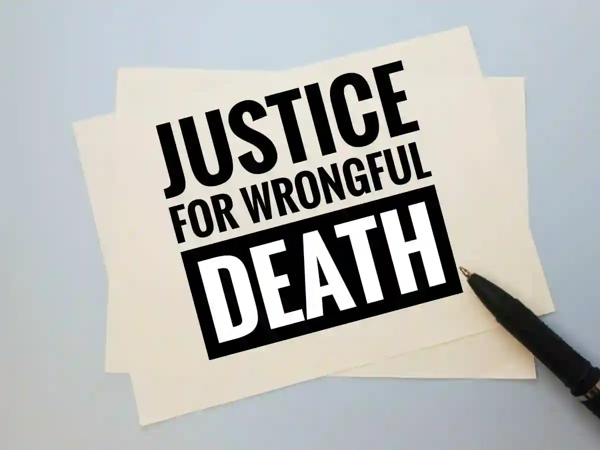 Justice for wrongful death concept with gavel, scale, and legal documents on desk, law, court, lawsuit, compensation, legal justice idea. used in Nashville Child Death Lawyer