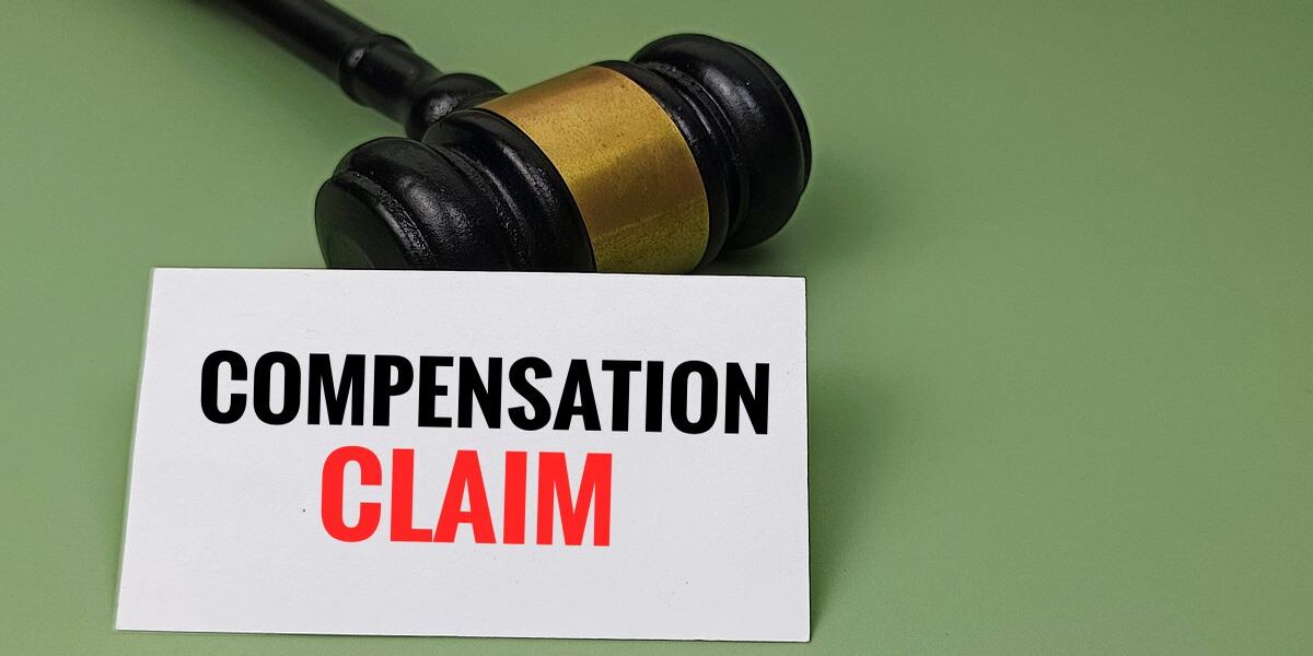 Compensation Claim Concept with Judge Gavel Representing Legal Proceedings, Financial Settlement, Liability, and Court Decision. used in Nashville Social Media Addiction Lawsuit