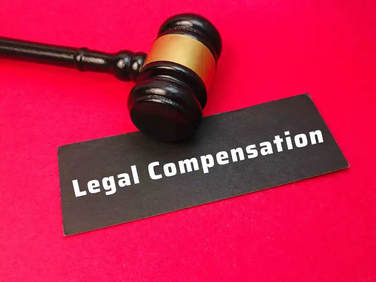 Legal Compensation Concept with Judge Gavel and Documents Representing Law used in Compensation in a Tennessee Hair Dye Lawsuit 